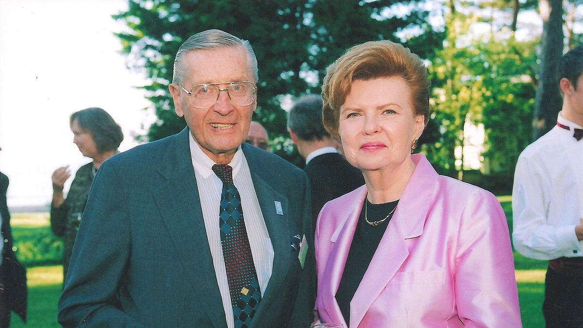 A. Raisters with the President of Latvia, Vaira Vīķe-Freiberga, in the early 2000s in Riga.